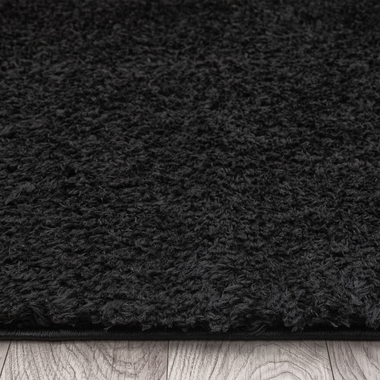 Fleecy 397 Ebony In Black Rug
