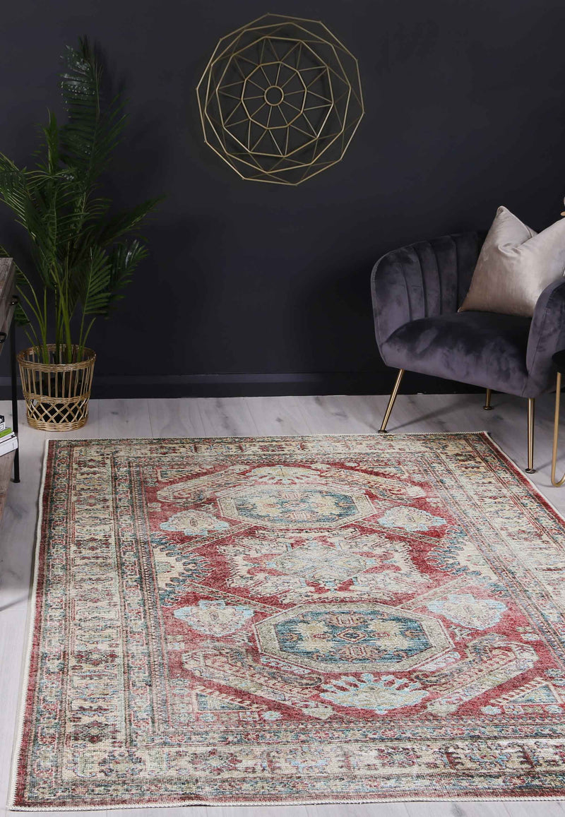 A traditional Persian-style rug with rich ruby red tones, featuring a distressed look that makes it perfect for the dining room as it can easily hide messes and spills. Made with NanoWipe technology, this rug is water and stain-resistant and can be easily wiped clean or machine washed.